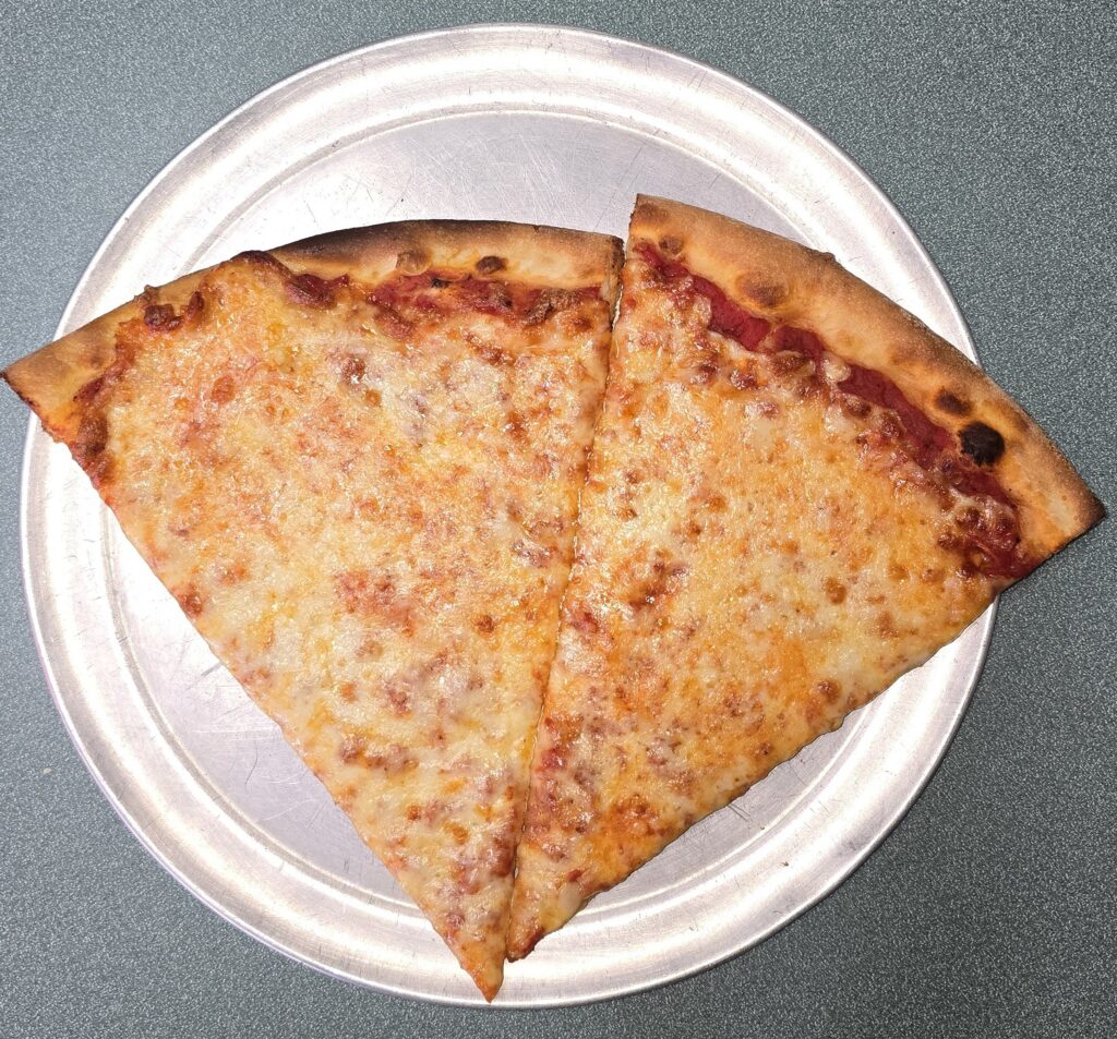 top down overhead view of 2 slices of plain cheese pizza at Miseno Pizza and Ristorante located at 1225 Ritner Hwy, Carlisle, PA 17013 - Review of of a Slice of Pizza at Miseno Pizza and Ristorante in Carlisle, PA