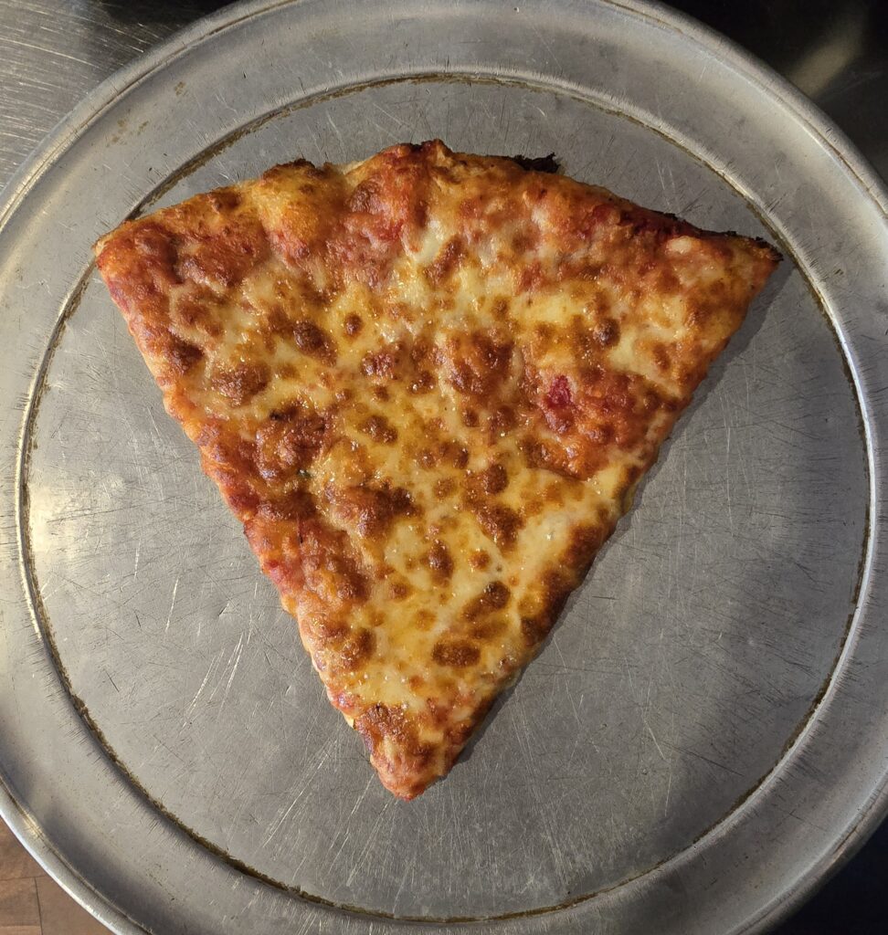 overhead straight down view of a plain slice of cheese pizza at george's subs and pizza for the article Review of a Slice of Pizza at George's Subs & Pizza in Carlisle, PA - awesome carlisle!